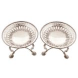 Pair of Irish eighteenth-century silver sweet meat dishes each on a tripod support Worldwide