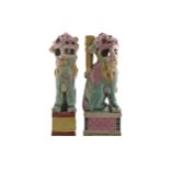 Pair of Chinese Qing Period famille rose foo dogs Worldwide shipping available. All queries must