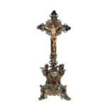 Reserve: 100 EUR        Miniaturkruzifix wohl Österreich, 19./20. Jh., Metall versilbert und