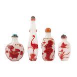 Reserve: 25 EUR        4 Snuffbottles China, Pekingglas, reliefierte Floral- und Tiermotive in