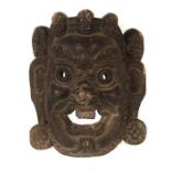 Reserve: 25 EUR        Tibetische Dämonenmaske Tibet, 20. Jh., Holz, dunkel patiniert, Maske mit