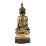 Buddha Shakyamuni Myanmar, wohl 19. Jh., Holz, schwarz grundiert, rot bemalt und vergoldet,