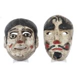 2 Masken Guatemala, Anfang 20. Jh., Hartholz, mit schwarzer und roter Bemalung auf weissem Grund,