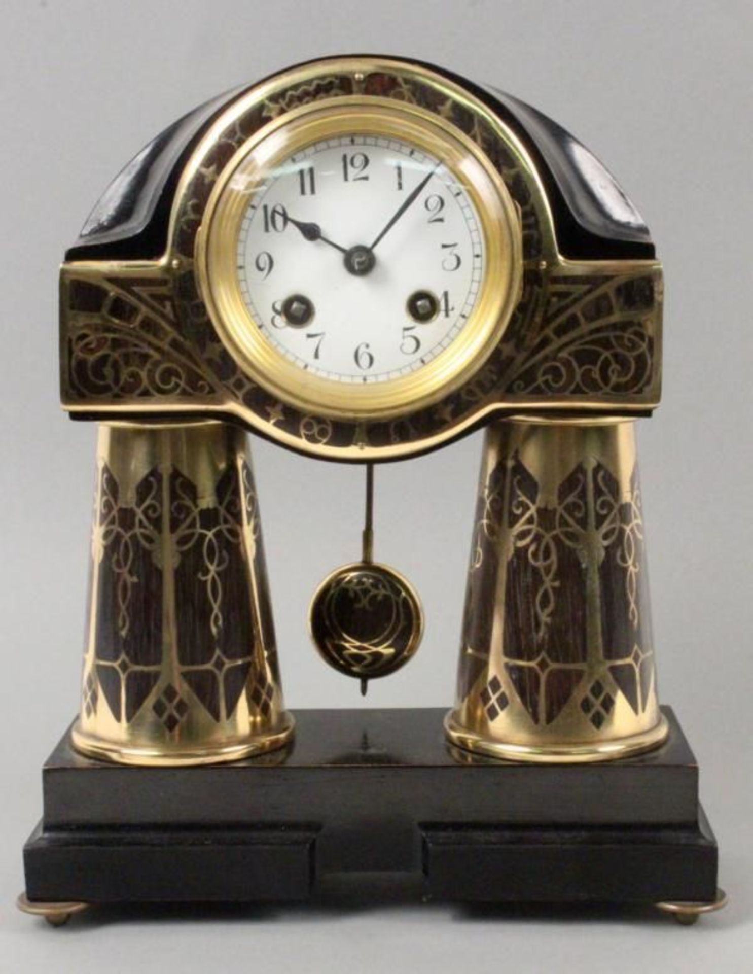 AN ART NOUVEAU MANTEL CLOCK Erhard & Söhne, Schw. Gmünd, ca. 1910 Lacquered wood with polished brass