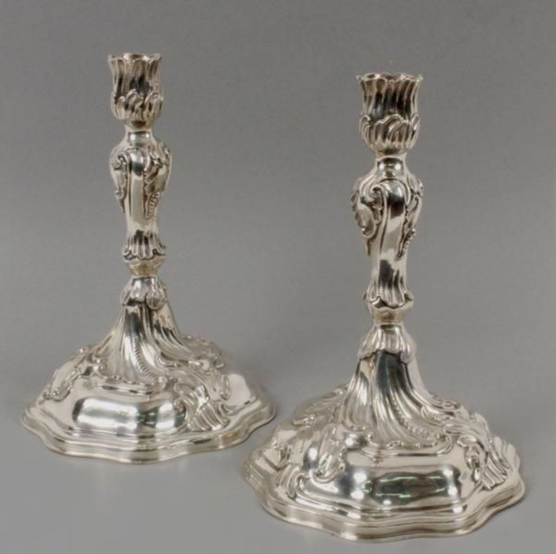 A PAIR OF CANDLESTICKS IN BAROQUE STYLE Silver, height 24cm, no marks, condition checked, ca.