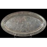 AN OVAL SNAKE SKIN SILVER TRAY probably Japan, ca. 1900 Silver, engraved decor with flowering