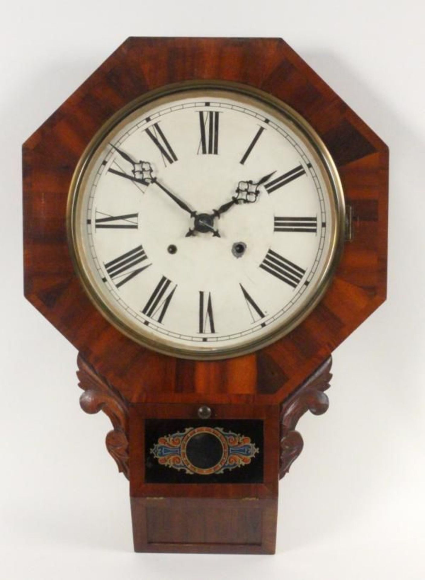 AN AMERICAN WALL CLOCK ca. 1900 Wooden case, folding pendulum window, painted dial, pendulum