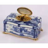 Opening: 1900 EUR    A SINGING BIRD BOX 20th century Porcelain with Dutch motifs in blue paint,