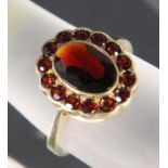 GRANATRING333/000 Gelbgold mit Granaten. Ringmaß 17,5mm, ca. 4,2gAufrufpreis: 40 EUR

A GARNET