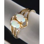 OPALRING585/000 Gelbgold mit 2 Edelopalen. Ringmaß 17,5mm, ca. 2,04gAufrufpreis: 120 EUR

AN OPAL