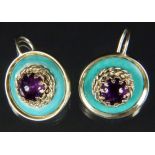 PAAR OHRRINGE585/000 Gelbgold mit Türkis und Amethyst-Cabochon. D. ca. 20mmAufrufpreis: 240 EUR

A