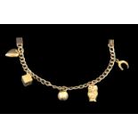 BETTELARMBAND750/000 Gelbgold. Mit 5 Anhängern. L.18cm, ca. 14,64gAufrufpreis: 280 EUR

A CHARM