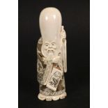 GÖTTERFIGURChina/Japan, um 1900 Elfenbein, bemalt. Glücksgott Fukurokuju. H.18cmAufrufpreis: 600 EUR