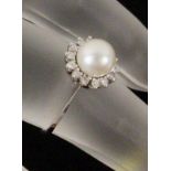 PERLENRING, 585/000 Weißgold mitBrillant von ca. 0,2ctAufrufpreis: 140 EUR

A PEARL RING14ct white