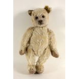 WEISSER STEIFF TEDDYBÄRMit Knopf und Label. L.37cm, bespieltAufrufpreis: 20 EUR

A WHITE STEIFF