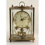 KUNDO JAHRESUHRVerglastes Messinggehäuse. H.21cmAufrufpreis: 20 EUR

A KUNDO ANNIVERSARY CLOCKGlazed