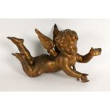 PUTTOHolz, geschnitzt und vergoldet. L.35cm. Min. rest.Aufrufpreis: 150 EUR

CUPIDCarved and gilt