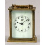 MINIATUR REISEUHR USA um 1920 Allseitig verglastes Messinggehäuse. Bez.: Waterbury Clock Co. USA.