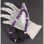 AMETHYST-KETTE mit Magnetschließe. Verlaufend, 10-15mm, L.51cmAufrufpreis: 60 EUR

AN AMETHYST PEARL