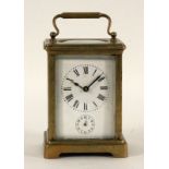 REISEUHR MIT WECKERFUNKTIONEngland um 1900 Allseitig verglastes Messinggehäuse. 8-Tagewerk mit