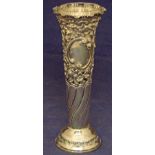 A late Victorian silver Vase of spiral tapering form, the upper section with flared rim, pierced