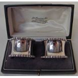 A good quality heavy pair of early 20th century silver Napkin Rings, of waisted form with beaded