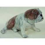 A Carlton Ware model of a British Bulldog in a semi recumbent pose, printed mark, painted TRIAL,