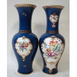 A pair of Tuscan china Vases of baluster form with long flared necks, mottled blue ground, gilded,