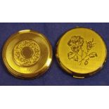 A Stratton ladies Powder Compact of circular form, gilt and machine finish with rose decoration to