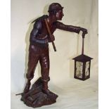 A 19th century French bronze patinated spelter figural Table Lamp as a miner holding a lamp and pick