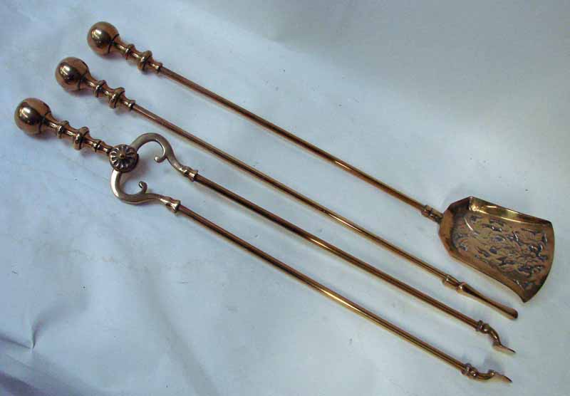 A good quality set of 19th century cast brass Fire Irons with ball finial handles, consisting of