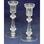 A pair of good quality cut glass Candlesticks, urnular slice cut sconce on tapering hexagonal stem