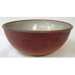 A Winchcombe studio pottery large Bowl, of typical design, incised rings to unglazed body,