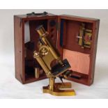 An early 20th century lacquered brass Monocular Compound Microscope by R and J Beck London, number