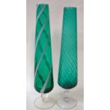 An Italian Empoli green glass tall Vase of tapering spiral fluted form on a clear glass knopped