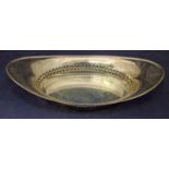 A George VI silver cake bowl of pierced oval shape and decorated rim, Birmingham 1937, 9.29oz, 30.