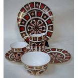 A late 20th century Royal Crown Derby table service for six plates in the Imari pattern No. 1128,