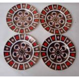 A set of four late 20th century Royal Crown Derby dinner plates, decorated in the Imari pattern, No.