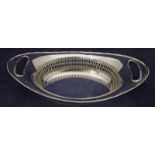 A 1930's English silver two-handled cake bowl of boat shape, foliate cast rim and handle rims,