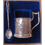 An early 20th century Russian cased silver presentation set consisting of a tankard, 10.5cm high, of