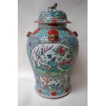 A large Chinese Famille Verte jar and cover of baluster form, repaired cover with temple dog knop,