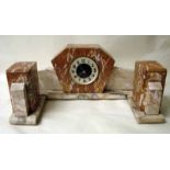 A French Art Deco clock garniture in two tone variegated marble, of typical form with a pair of