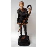 Marcel Debut (French 1865-1933) a bronze and ivory figural model of a standing musician playing a