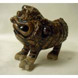 A Chinese glazed stoneware vase or spoon warmer in the form of a grotesque three legged  toad,