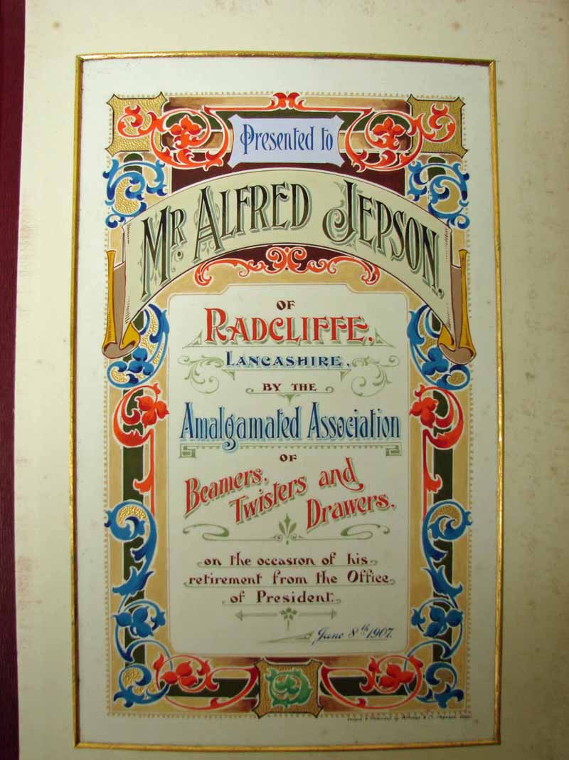 Textile History, a leather bound hand decorated Presentation Testimonial volume, presented to Mr