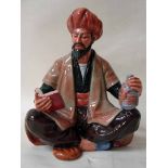 A Royal Doulton figure modelled as Omar Khayyam, number HN2247, copyright 1964, 16.5cm high