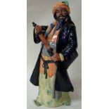 A Royal Doulton figure modelled as Blue Beard, number HN2105, copyright 1952, 26cm high