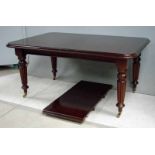 A William IV style mahogany draw leaf dining table, the moulded rectangular top with rounded