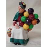 A Royal Doulton figure modelled as The Old Balloon Seller, number HN1315, 19cm high