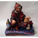 A Royal Doulton figure modelled as The Potter, number HN1493, 18.5cm high